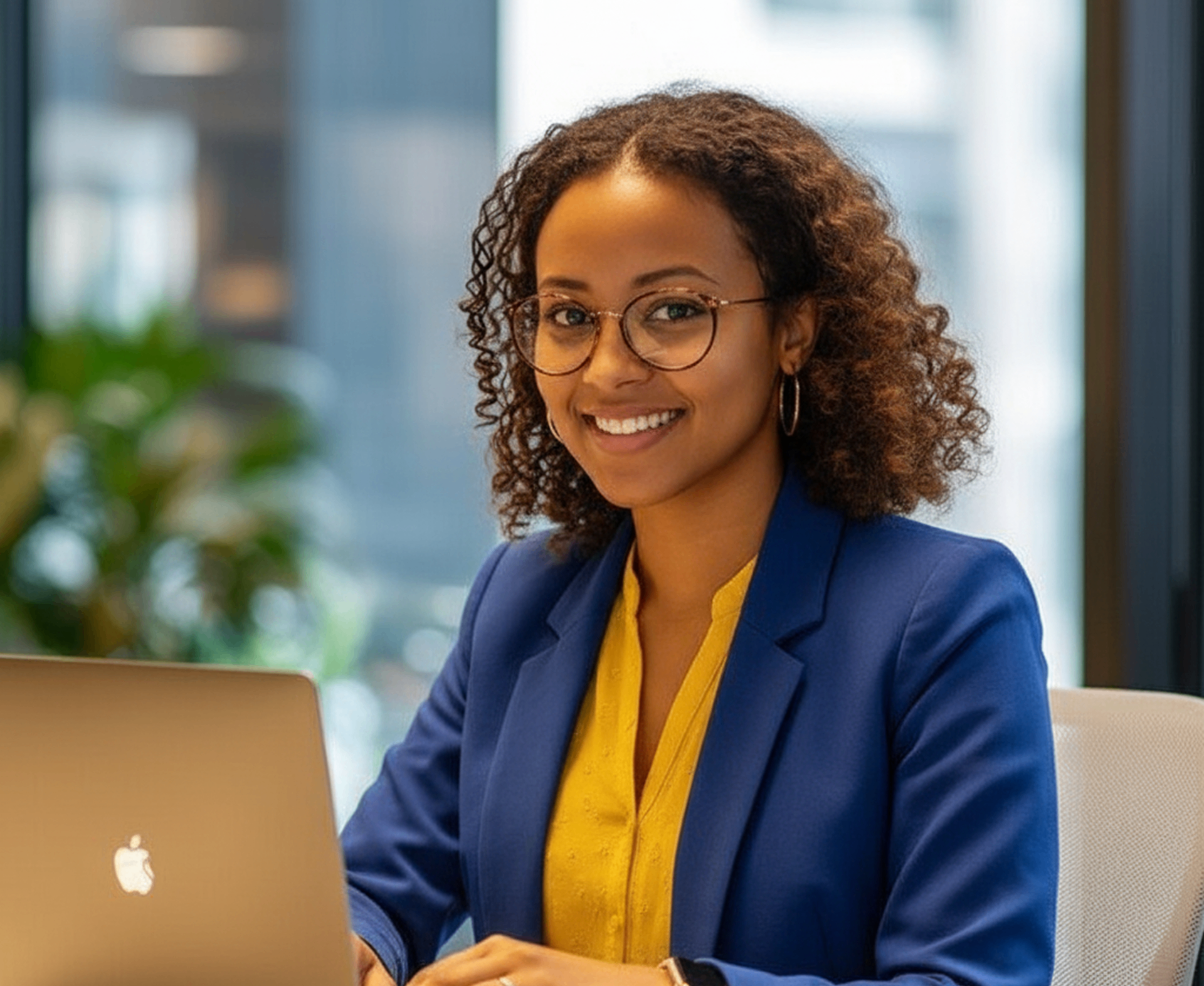 Professional African businesswoman with laptop